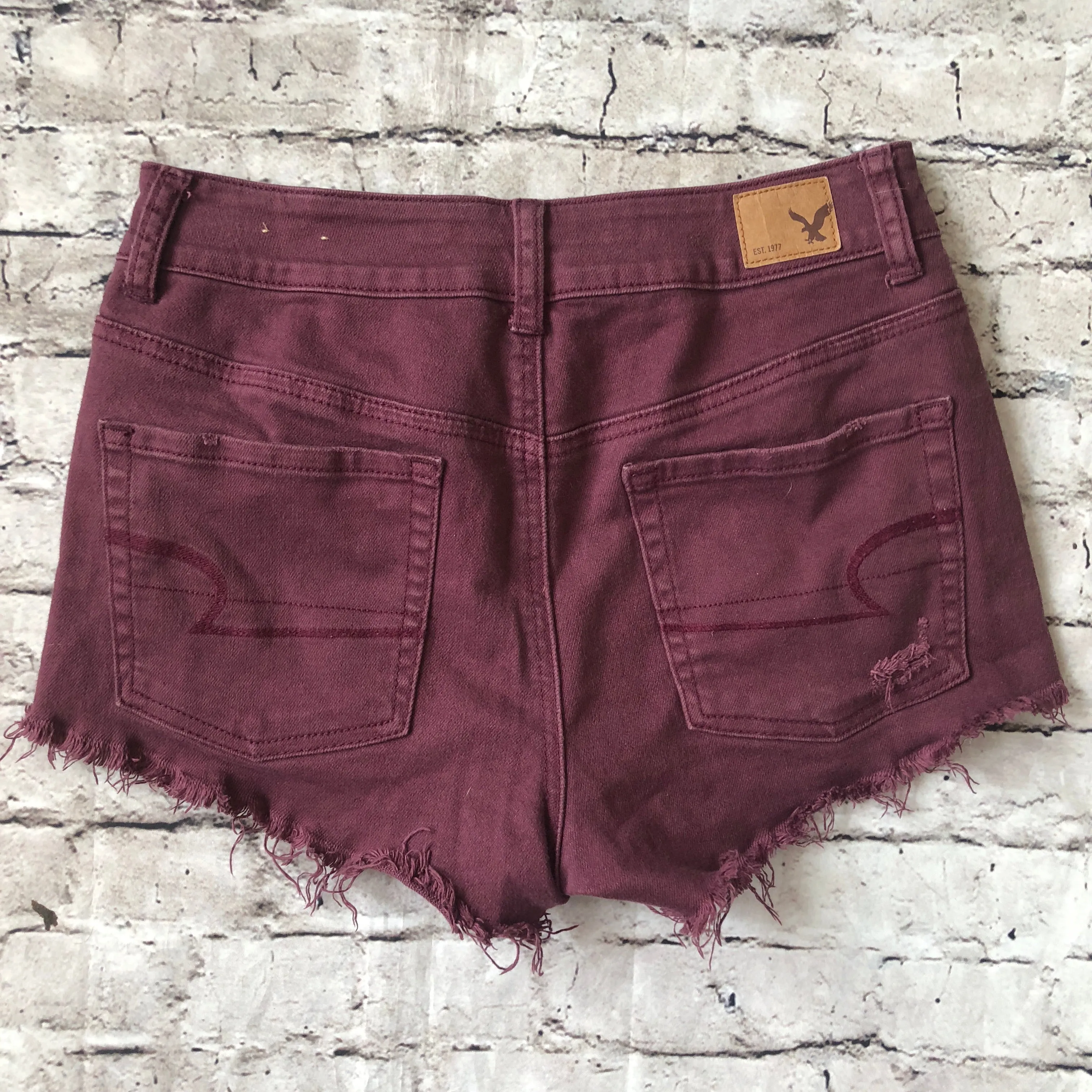 AMERICAN EAGLE Maroon Distressed Stretch Jean Shorts Size 4