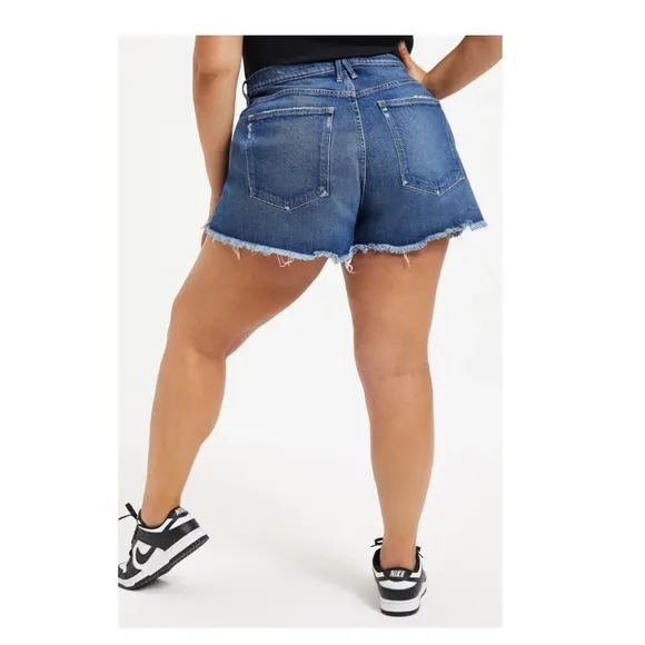 Good American 90’s High Waisted Denim Split Level Hem Shorts