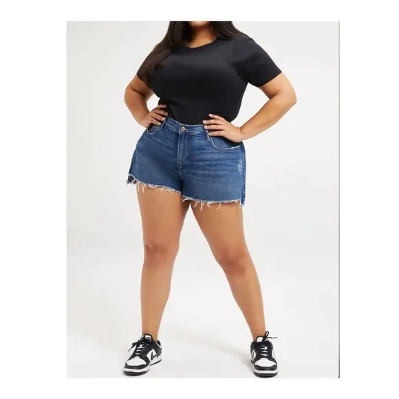Good American 90’s High Waisted Denim Split Level Hem Shorts